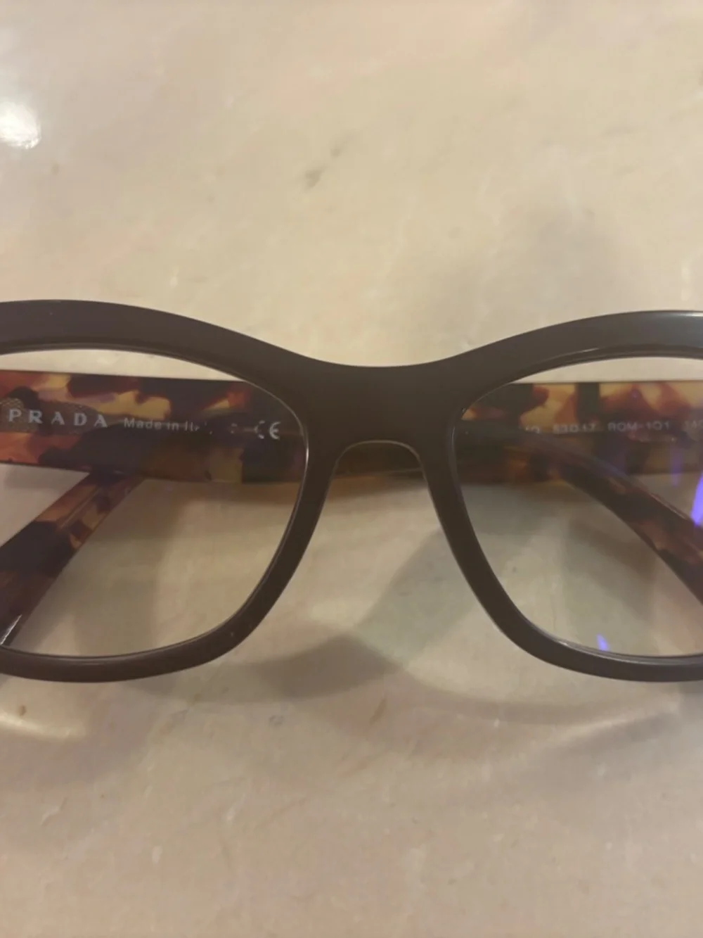 Lot of used Prada and Tom Ford glasses.